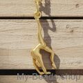 Gold plated zilveren hanger van een gymnaste die een handstand of bruggetje uitvoert. Hanger in 3-D. 
Mooi cadeau voor verjaardag of wedstrijd.