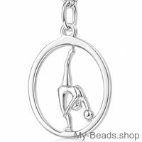Silver pendant featuring a gymnast performing a rhythmic gymnastics routine with a ball on the floor during a competition.
A beautiful gift for a birthday or Christmas.