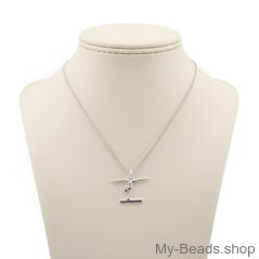 Silberne Halskette mit einem silbernen Anhänger, der eine Turnerin im Handstand auf dem Schwebebalken zeigt.
Geschenkidee: Weihnachten, Geburtstag