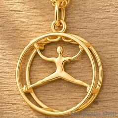 A gold-plated silver pendant depicting a gymnast performing a routine in a Rhönrad.
A beautiful birthday gift or Christmas.