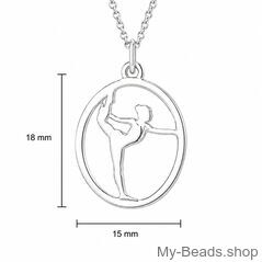 Afmeting van een sieraad. Zilveren hanger van een gymnaste die een artistieke gymnastiek oefening op toestel vloer uitvoert tijdens een wedstrijd.