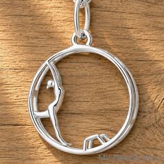 Sterling silver pendant featuring a gymnast performing a wheel gymnastics exercise during a competition.
A beautiful gift for a birthday or Christmas.