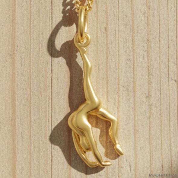 Gold plated zilveren hanger van een gymnaste die een handstand of bruggetje uitvoert. Hanger in 3-D. 
Mooi cadeau voor verjaardag of wedstrijd.